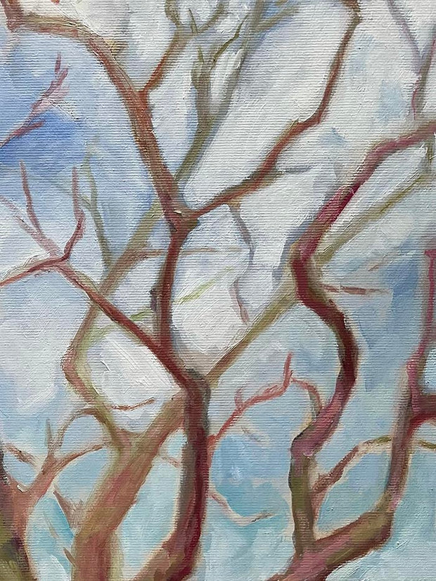 close up of tree painting and blue sky