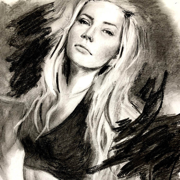Custom charcoal sketch of a powerful woman by Canadian portrait artist Serena West